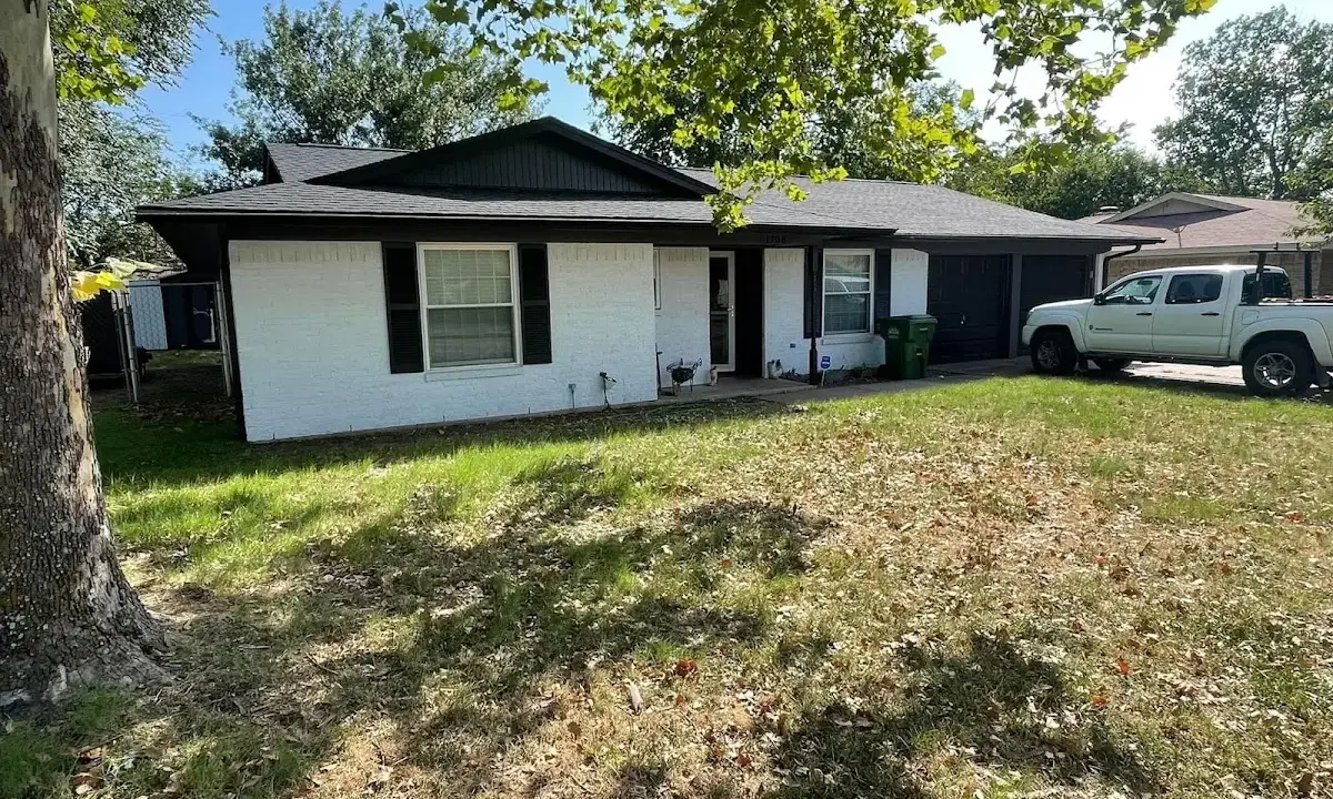 Professional roofing crew working on a residential roof in Steelton